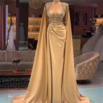 Elegant Gold Champagne Dresses with Cape Sleeve Jewel Neck Line - Satin Beaded Mermaid Evening Gown - Prom Weddings